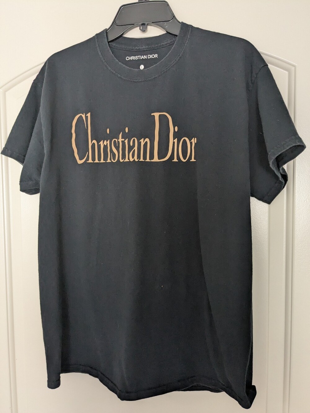 Black “Christian Dior” logo tee, size L.